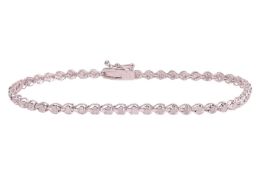 A white sapphire line bracelet, comprising a series of fifty round-cut white sapphires in four claw 