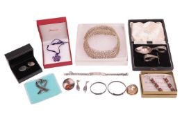 A mixed group of jewellery items; including examples of a Tiffany & Co. silver heart brooch by P
