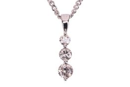 A three-stone diamond pendant, claw-set with three round brilliant diamonds of graduated sizes, with