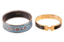 Hermès - a narrow 'Clic H' bracelet with black enamel and gold-tone metal, signed and marked, intern
