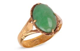A jadeite-set dress ring, composed of an oval-cut jadeite cabochon, in a four-prong setting, to a ye