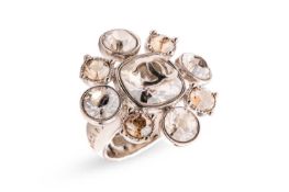 Chanel - a crystal cocktail ring, the floral cluster centred with an applied CC logo motif, to an em