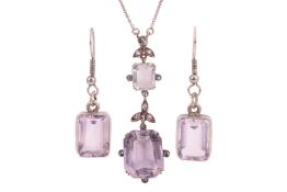 An Edwardian amethyst and diamond lavaliere necklace and a pair of earrings; the pendant of floral d