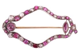 A ruby and diamond-set openwork navette brooch, composed of a row of alternating ruby and rose-cut d