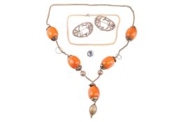 A small group of jewellery items comprising a pair of paste-set buckle brooch conversions, a faux pe