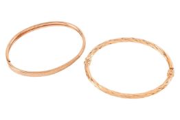 Two 9ct gold hinged bangles; to include a bracelet of hollow twisted rope design, fastens with a ton