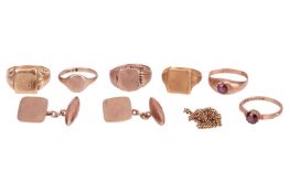 A small group of jewellery comprising five 9ct gold rings, a pair of 9ct gold cufflinks, an 18ct gol