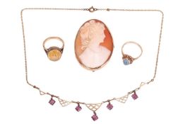 A small group of jewellery; the first piece a cameo brooch, featuring a lady with curled hair, to a 