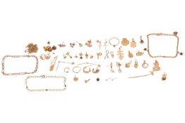 A large group of mixed quantity of yellow metal jewellery items, to include examples of charms, gem-
