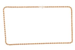 A long twisted rope link necklace, completed with a spring ring clasp, yellow metal bearing Italian 