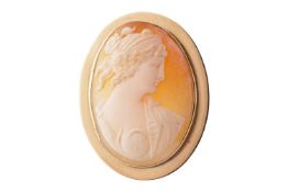 A shell cameo brooch cum pendant, depicting a classical portrait of Athena, in a yellow metal oval m