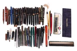 A group of vintage fountain pens, including a Parker (Canada) 5-16 