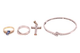 A small group of jewellery items comprising a paste-set hinged bangle, in white metal marked ‘925’, 