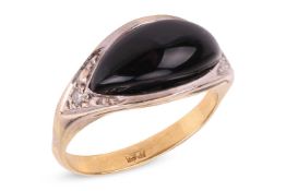 An onyx and diamond dress ring, comprising a domed navette-shaped onyx cabochon, between diamond-set