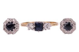 A sapphire and diamond dress ring and stud earrings en-suite; the three stone ring centred with a st