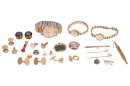 A pair of oval cufflinks; the hollow plaques with traces of an 18 carat mark (one chain link broken)