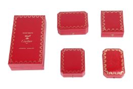 A group of four Cartier jewellery boxes, and a Must de Cartier perfume exterior box. (5)