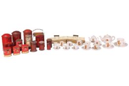 A collection of Burnett Ltd (and others) tinplate money boxes, modelled as traditional red post offi