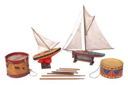 An early 20th century scratch built wooden sailing boat on stand, 60 cm x 55 cm, together with anoth