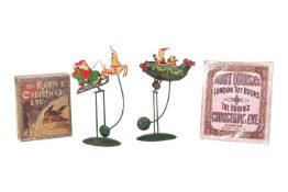 Two vintage Christmas folk art pendulum swinging models, early 20th century each, featuring Father C