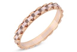 A bi-coloured 'Jubilee'-style ring, stamped '585' and testing as 14 carat gold. Size N, 1.8 grams.Pl