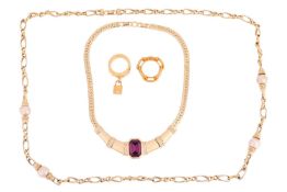 Two Christian Dior costume jewellery necklaces, one set with a large purple paste in gold-tone gilt 