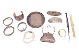 A mixed group of silver and white metal items; comprising three silver bangles, and another stamped 