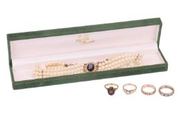 A small group of jewellery items comprising an illusion-set diamond solitaire ring, in a 9ct gold mo