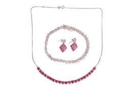 A group of jewellery items comprising a diamond-set bracelet, in a silver mount, together with a gla