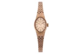 Rotary – A 9ct Gold Dress Watch Bezel: Bark-Texture Case Material: 9ct Yellow Gold Case Diameter: 14
