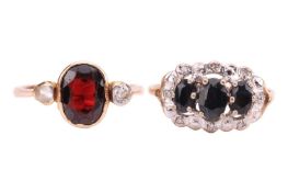 Two rings; comprising a garnet-set ring, flanked by one diamond and one paste, in a yellow metal mou