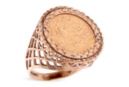 A mounted half sovereign ring, with an Edward VII 1909 half sovereign, in a 9ct gold ring mount, wit