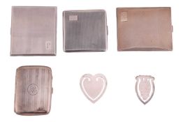 A 1930s engine-turned rectangular silver cigarette case. Birmingham 1934, together with one slightly