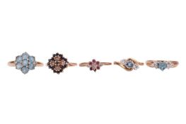 Five rings; comprising a 9ct gold sapphire and diamond floral cluster ring, size M, a blue topaz flo