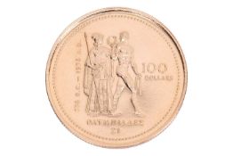 An Elizabeth II 1976 Canadian Olympic commemorative 100 dollar gold coin, in a fitted case; 13.3 gra