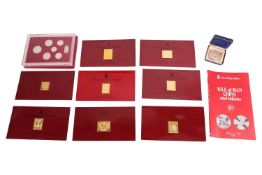 A quantity of silver set coins and stamp sets, comprising eight Empire Collection gold-plated silver
