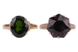 Two gem-set rings in 9ct gold; the first contains an oval-cut chrome diopside between CZ embellished