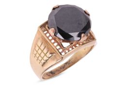 A black synthetic moissanite ring, comprising a large round circular-cut synthetic moissanite measur