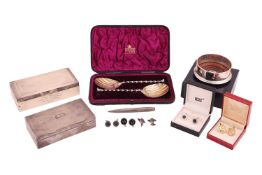 A cased pair of Victorian cased fruit serving spoons, spoons and two silver cigarette cases.