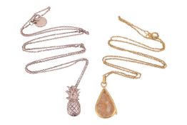 A pendant necklace by Alex Monroe and a teardrop locket necklace by Lilly & Roo, the cable-link 
