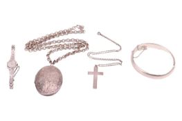 A mixed group of jewellery items comprising a silver oval locket, engraved with scrolling foliate de