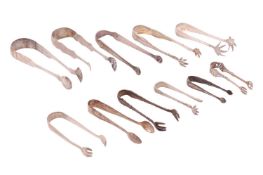 A pair of George III bright cut sugar nips, together with two pairs of 19th century American sugar n