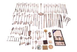 A large group of silver plate items, including examples of three pairs of grape scissors in differen