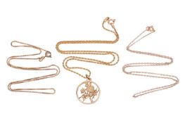 A pendant on chain and two further chains; the 9ct textured floral pendant suspending on a 43.0 cm l