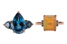 Two gem-set rings in 9ct gold; to contain a step-cut fire opal between gem-set shoulders, size M; an