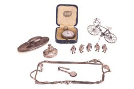 A collection of silver items; comprising a long necklace measuring 88.0 cm, with angular links and a