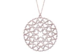 Tiffany & Co – A crown of hearts pendant, by Paloma Picasso for Tiffany & Co., featuring a r