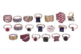 A group of twenty gem-set rings, in silver or white metal marked ‘925’, including a diamond-set abst