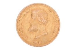 A 10,000 Brazil 1867 Reis coin, featuring Pedro II to the obverse, 1867, the reverse with the coat o