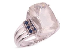 A goshenite (white beryl) dress ring in 9ct gold, the rectangular cushion-cut goshenite measures 14.